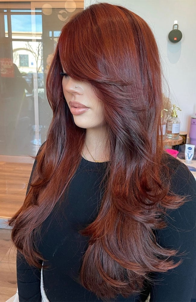 Dark Red Long Layers With Side Curtain Bangs — Classy Side Bangs