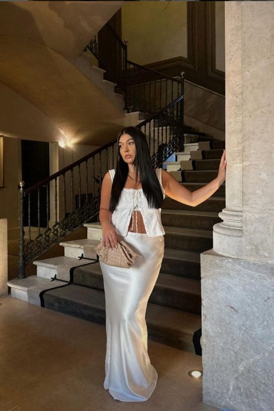 Ivory Silk-Like Maxi Skirt With Cropped Top, A Woman Wears A Long — Classy Silk Skirt Outfit
