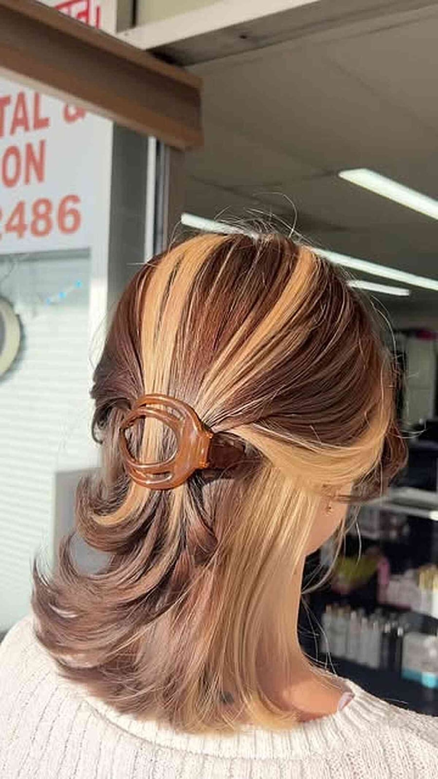 Collarbone Angled Bob With Chunky Blonde Highlights — Classy Skunk Stripe Hair