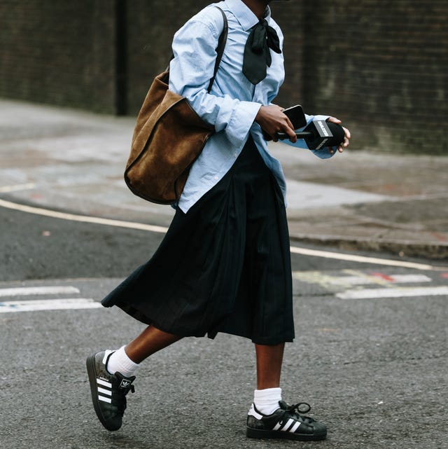 Black Sneakers with a Pleated Skirt and Button-Down, Close-Up Take Black Sneakers with a Pleated Skirt and Button-Down, Close-Up Take — Classy Sneakers Outfits