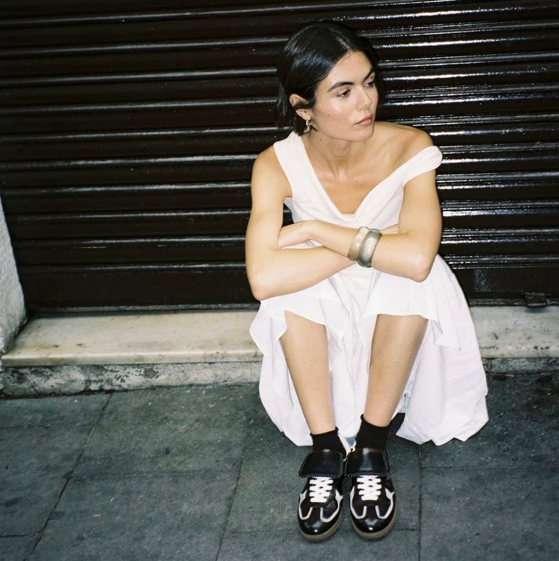 White Off-The-Shoulder Dress with Black and White Sneakers White Off-The-Shoulder Dress with Black and White Sneakers — Classy Sneakers Outfits