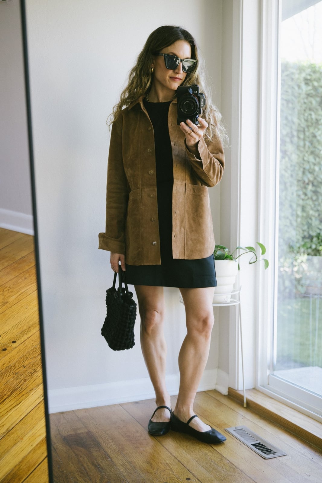Brown Suede Jacket Over Black Mini Dress With Chic Casual Look Brown Suede Jacket Over Black Mini Dress With Chic Casual Look — Classy Suede Jacket Outfits