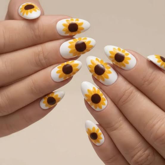 White Medium Almond Nails With Large Sunflowers White Medium Almond Nails With Large Sunflowers — Classy Sunflower Nails