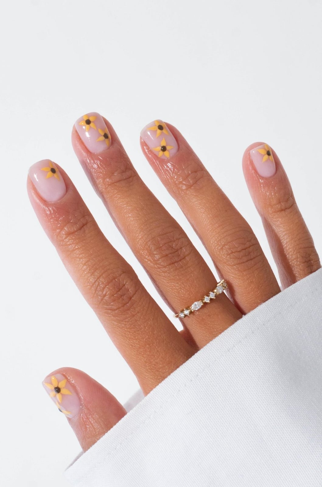 Medium Almond Sheer Base With Delicate Sunflowers Medium Almond Sheer Base With Delicate Sunflowers — Classy Sunflower Nails