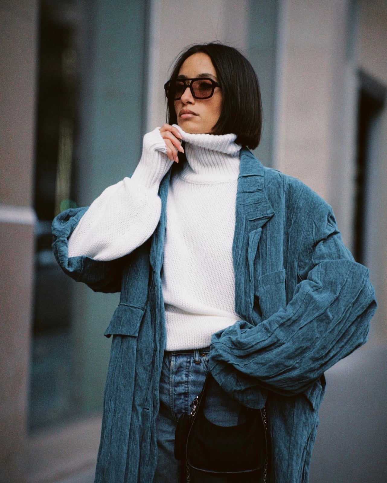 White Turtleneck Under a Teal Textured Jacket — Classy Sweater Outfits for Women