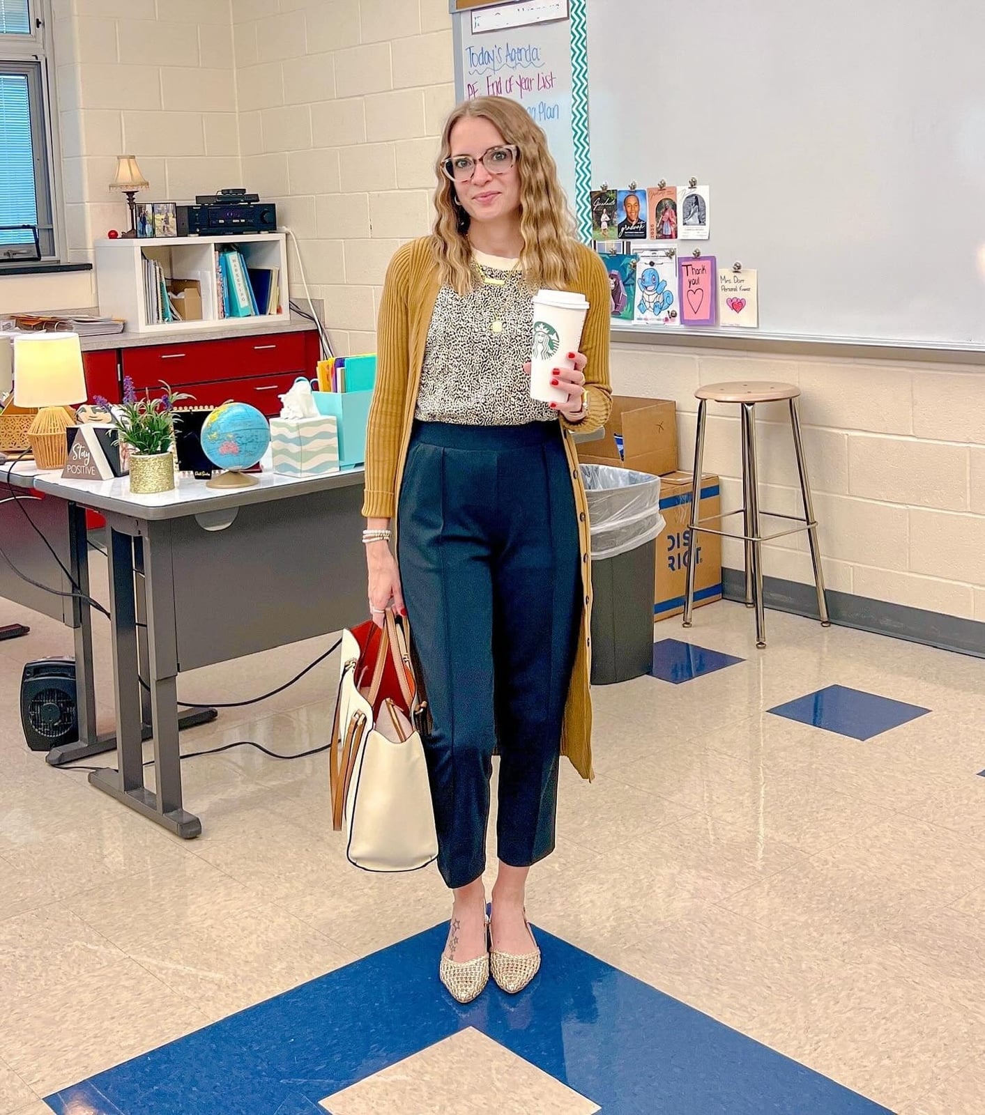Mustard Cardigan Over Patterned Blouse and Navy Trousers — Classy Teacher Outfits