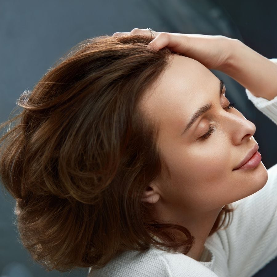 Shoulder Medium Brown Layered Cut With Curtain Bangs and Loose Waves Shoulder Medium Brown Layered Cut With Curtain Bangs and Loose Waves — Classy Textured Hair