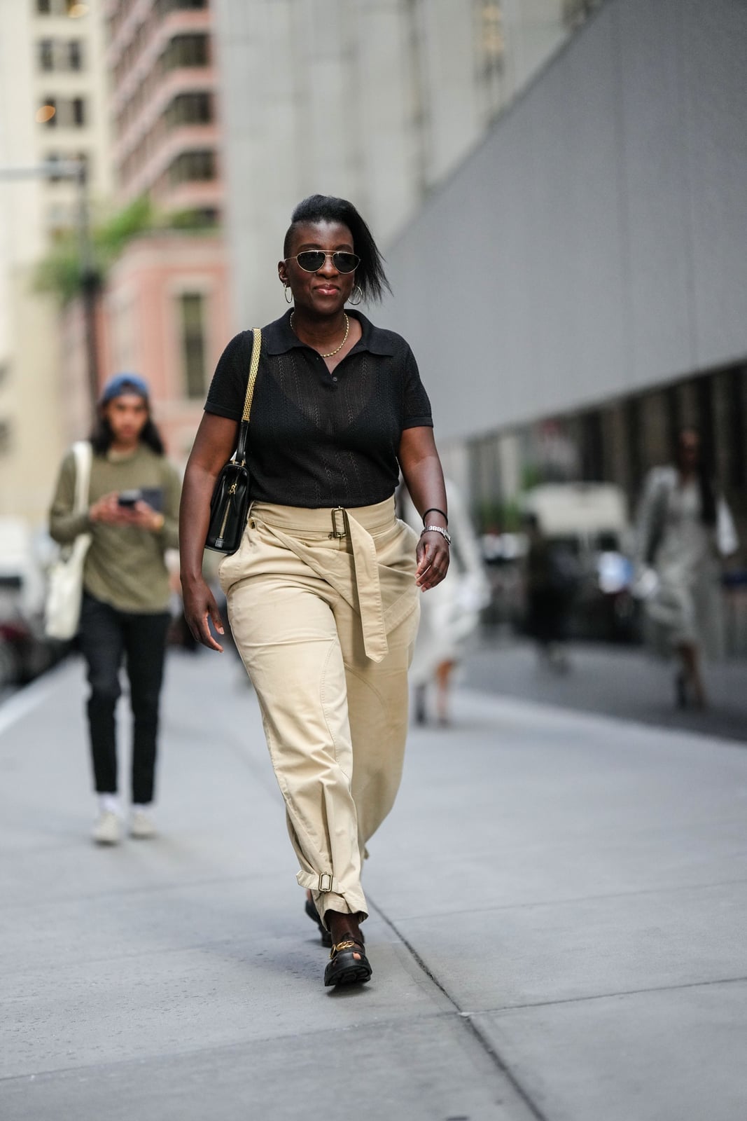 Black Polo and Beige Wide-Leg Pants Casual Outfit Black Polo and Beige Wide-Leg Pants Casual Outfit — Classy Theme Park Outfits