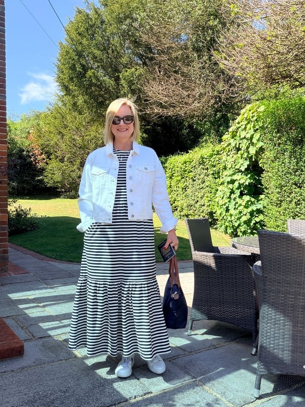 Denim Jacket Over Striped Maxi Dress Denim Jacket Over Striped Maxi Dress — Classy Travel Outfits