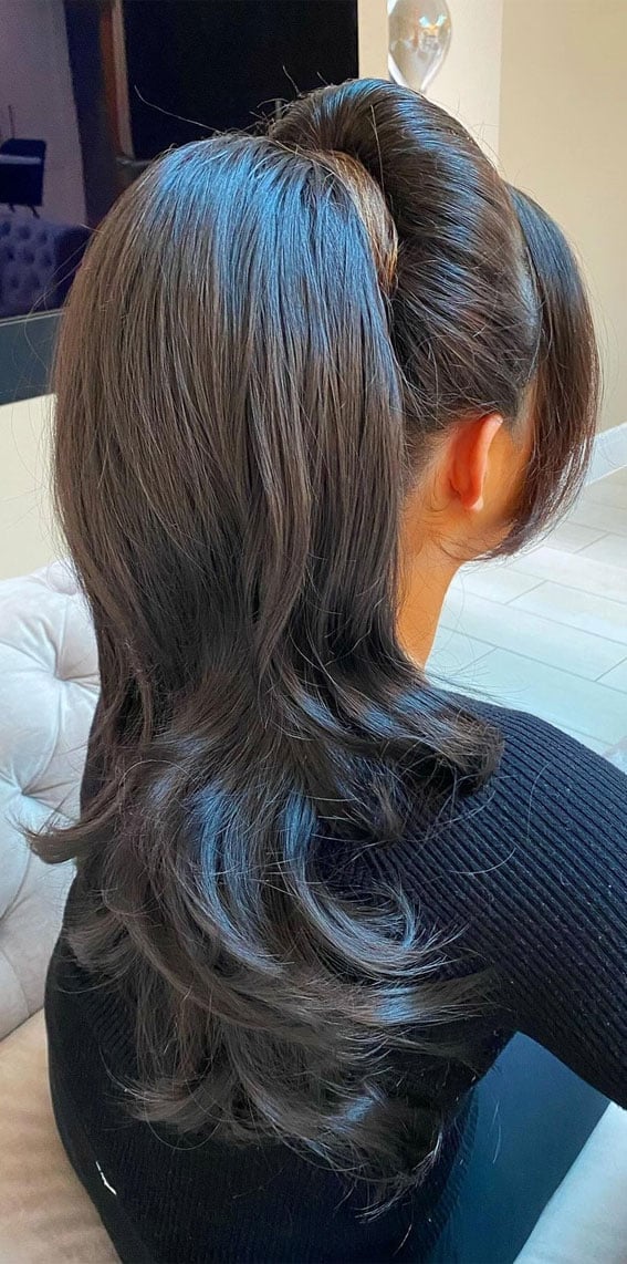 Dark Brown Voluminous Ponytail With Side Bangs — Classy Updo Ponytail