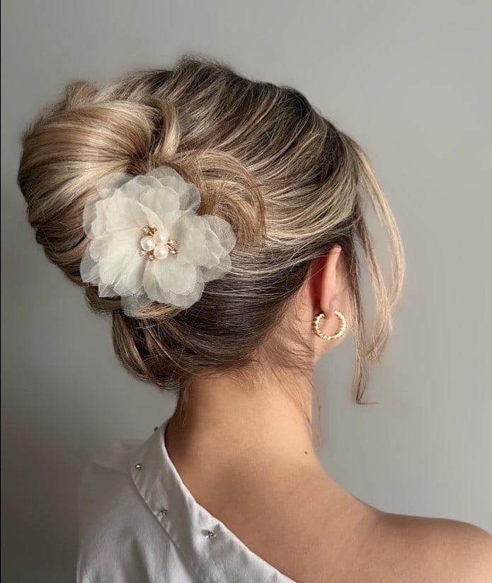 Textured Blonde Updo With Floral Accessory Textured Blonde Updo With Floral Accessory — Classy Updo Wig