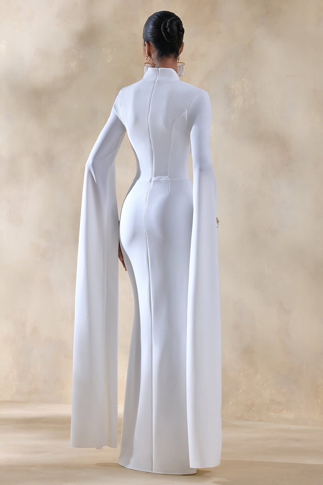 White Column Dress With Dramatic Cape Sleeves White Column Dress With Dramatic Cape Sleeves — Classy White Dresses Outfit