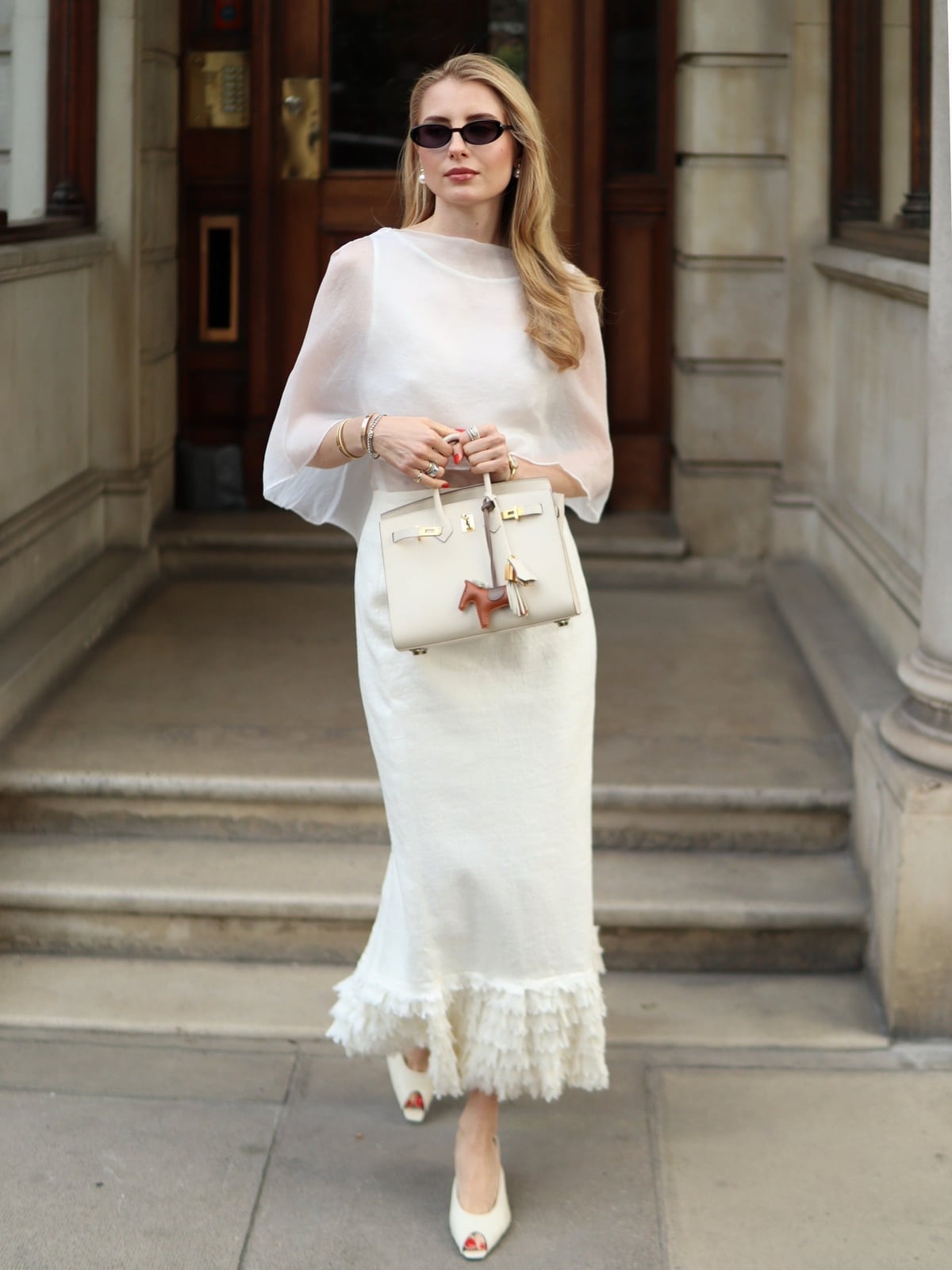 A Sheer Organza Cape Over a White Outfit A Sheer Organza Cape Over a White Outfit — Classy White Outfits