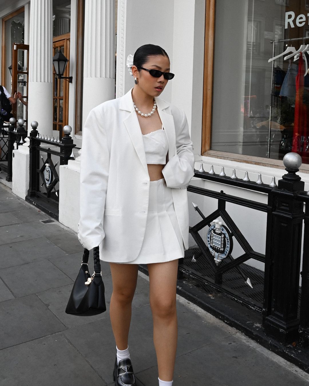 Oversized Blazer Over White Crop Top and Pleated Mini Skirt Oversized Blazer Over White Crop Top and Pleated Mini Skirt — Classy Y2K Outfits