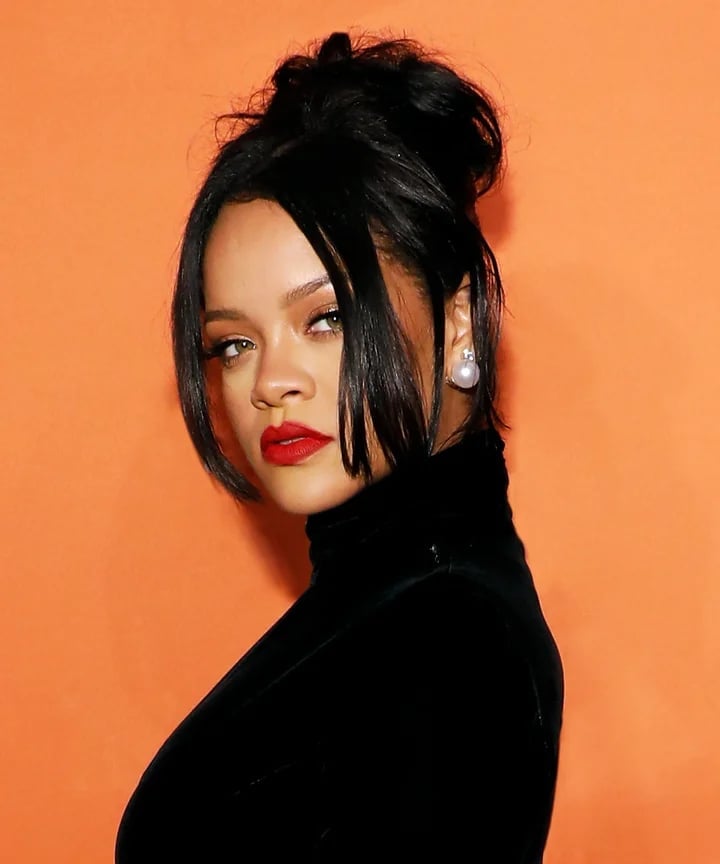 Voluminous Messy Black Updo With Face-Framing Pieces — Classy Y2K Updo