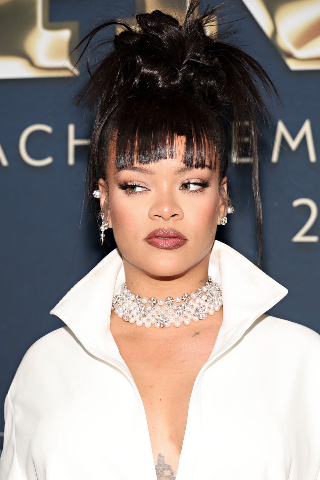 High Spiky Dark Brown Updo With Wispy Baby Bangs — Classy Y2K Updo