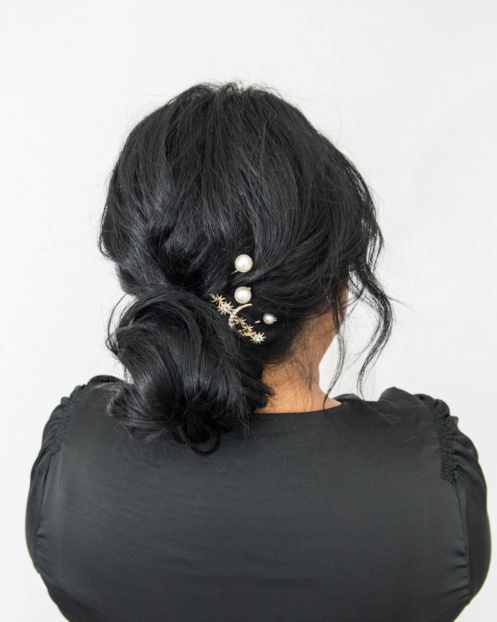 Messy Black Bun With Decorative Pins — Classy Y2K Updo