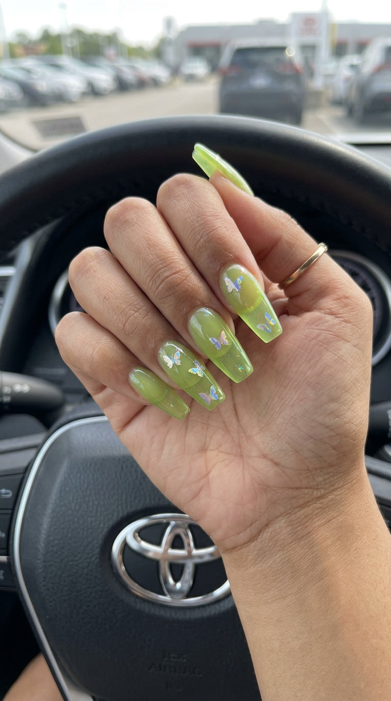 Lime Green Butterfly Nails 2026 | Nostalgic Summer Playful lime green jelly nails with Y2K iridescent butterfly graphics for a nostalgic summer weekend. Colourful summer nails 2026.