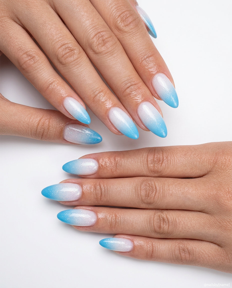 Oceanic Glitter Fade Nails | Colourful Summer Nails 2026 Oceanic Glitter Fade nails: soft nude to sky blue ombre with iridescent glitter. Colourful summer nails 2026 inspo.