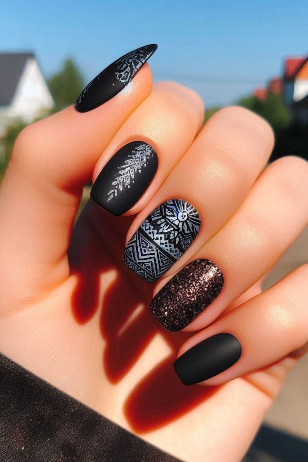Medium Almond Matte Black with Silver Tribal Patterns Medium Almond Matte Black with Silver Tribal Patterns — Cute Black Nails