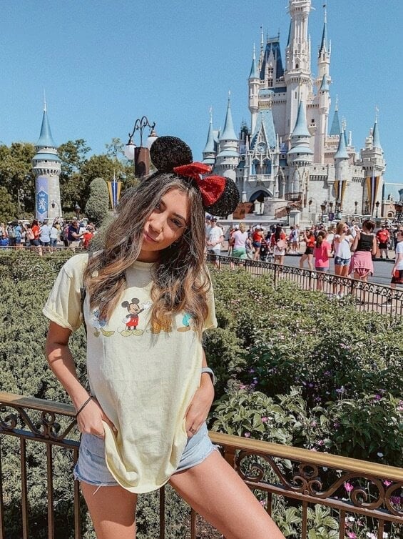 Yellow Graphic Tee With Denim Shorts And Mouse Ears and Loose Fit — Cute Disney Outfit Inspo