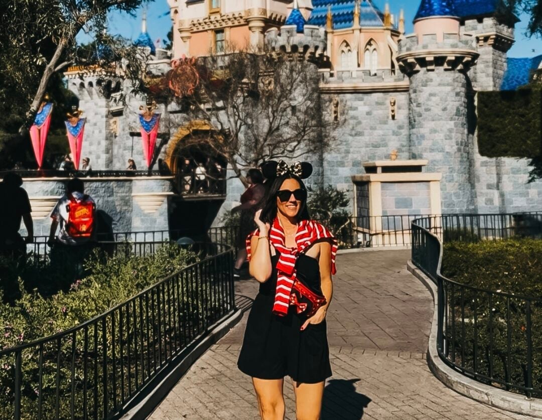 Black Dress With Striped Sweater And Mickey Ears — Cute Disney Outfit Inspo