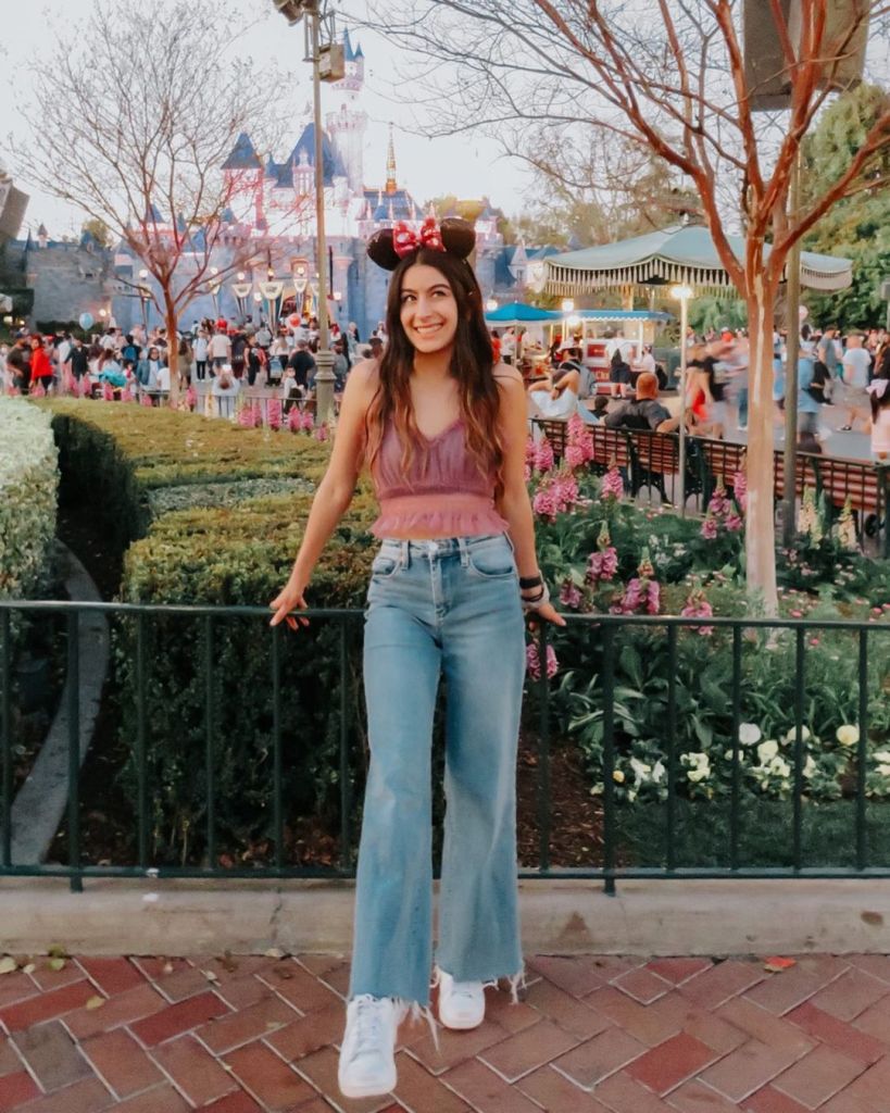 Purple Crop Top With Wide Leg Jeans And Mouse Ears — Cute Disney Outfit Inspo