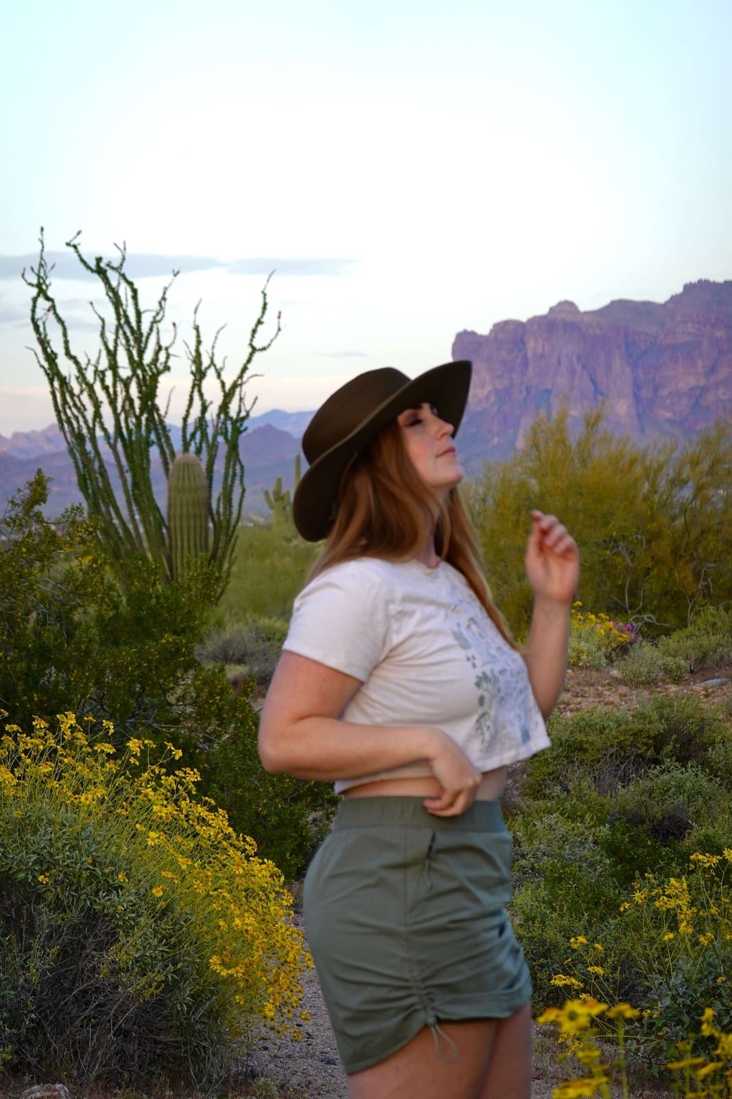 Graphic Tee and Drawstring Shorts with a Wide-Brim Hat — Cute Hiking Outfit Inspo