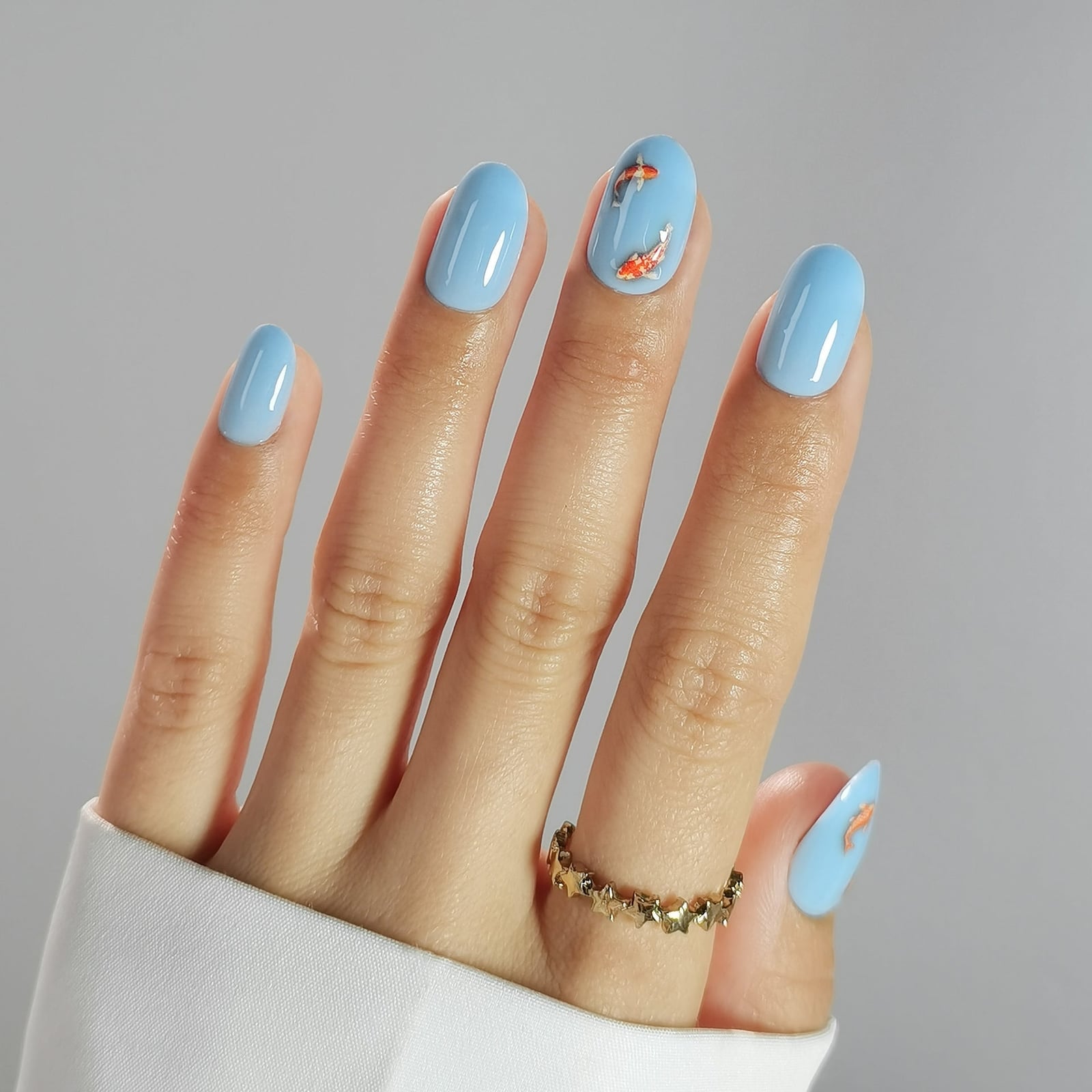 Sky Blue Oval Nails With Koi Fish Decals Sky Blue Oval Nails With Koi Fish Decals — Cute Oval Nails
