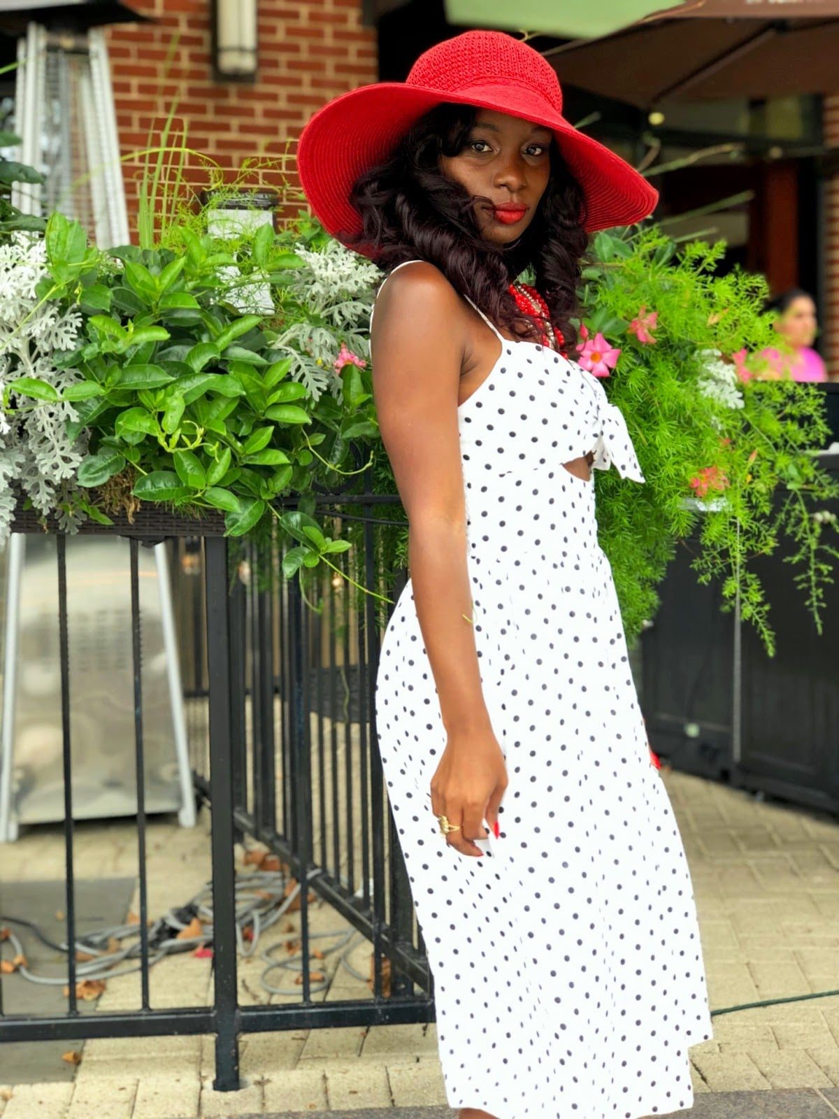 White Polka Dot Midi Dress With Red Hat, Close-Up Take — Cute Polka Dot Outfits