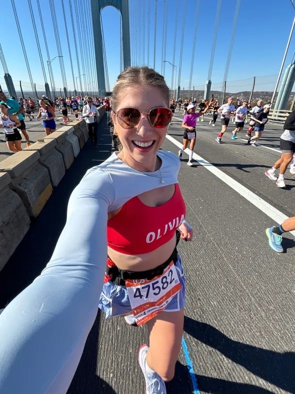Grey Cut-Out Top Over Red Sports Bra with Blue Skirt Grey Cut-Out Top Over Red Sports Bra with Blue Skirt — Cute Running Outfits