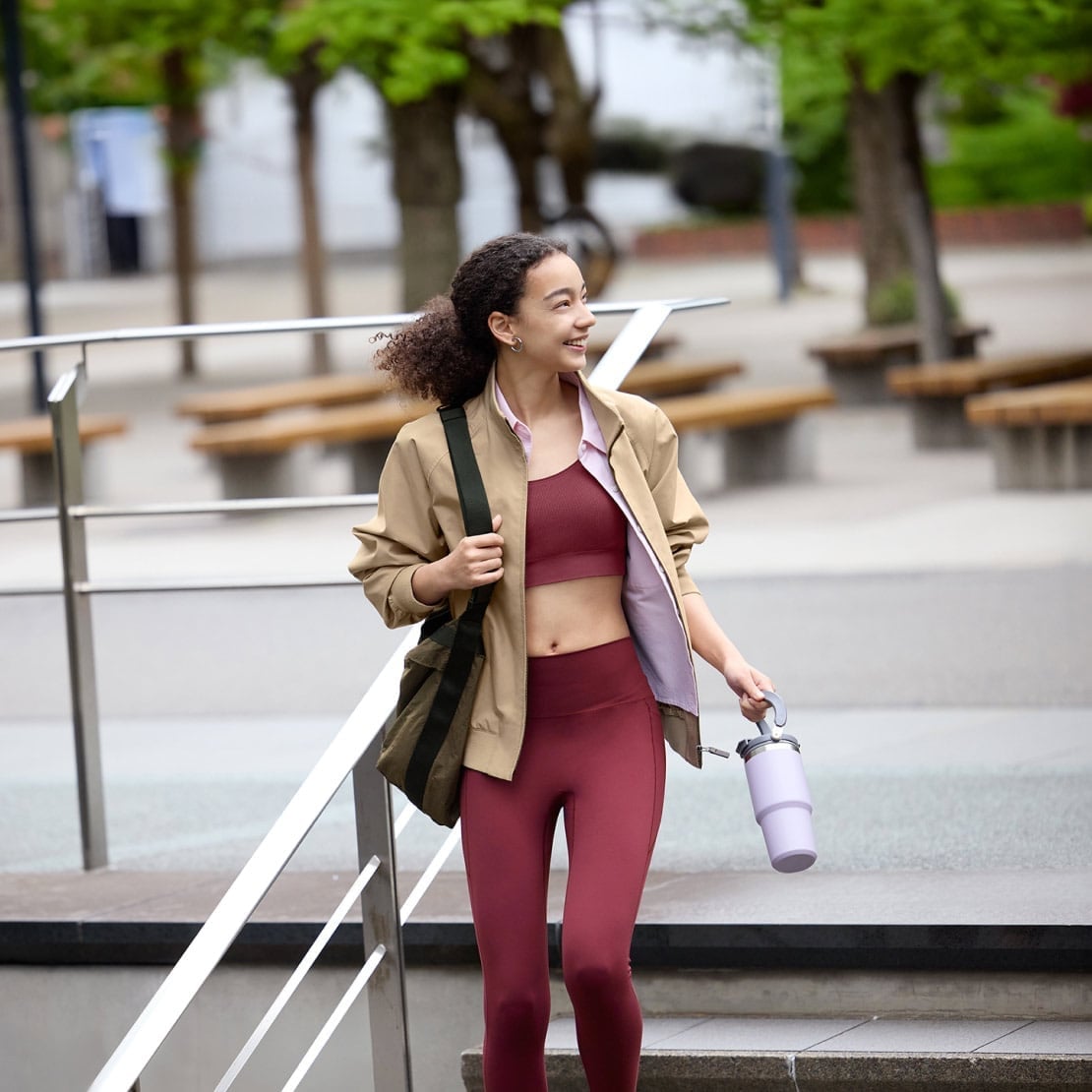 Tan Bomber Jacket Over Burgundy Sports Bra and Leggings Tan Bomber Jacket Over Burgundy Sports Bra and Leggings — Cute Running Outfits