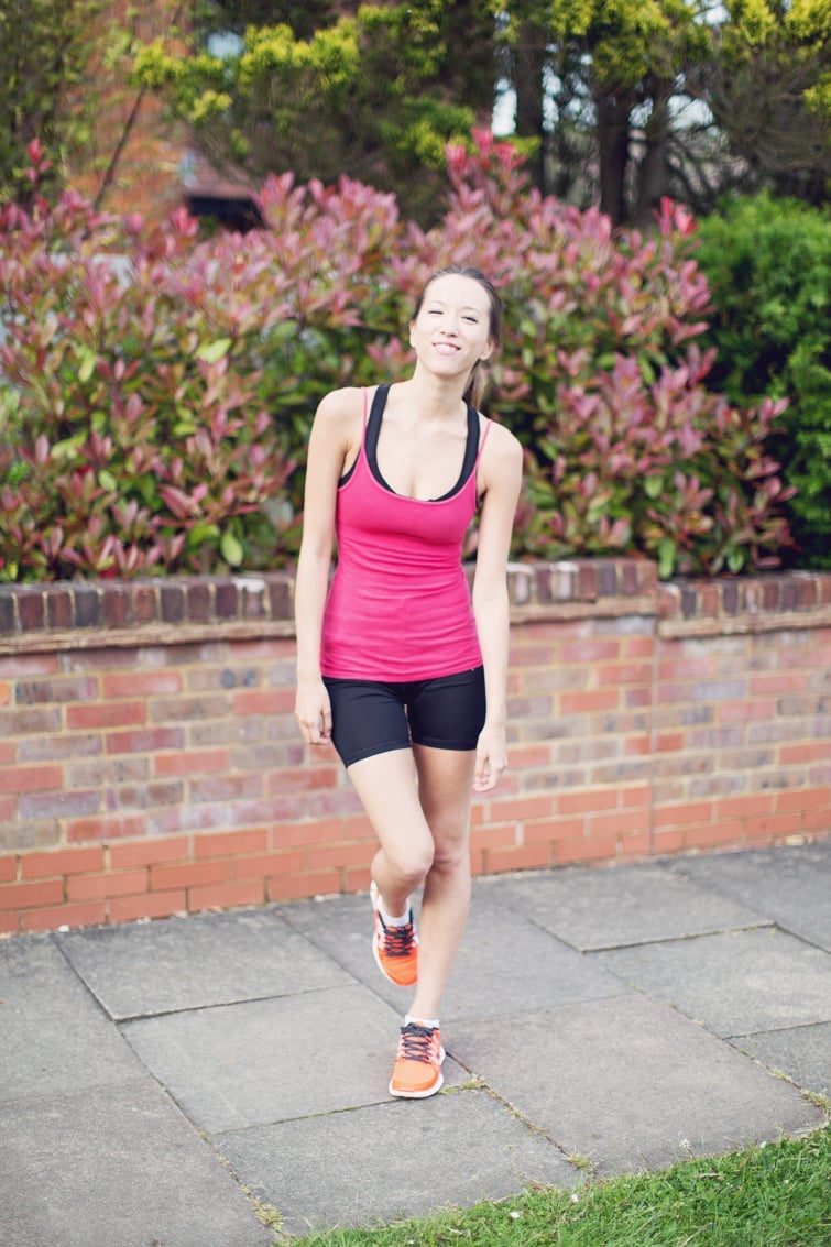 Bright Pink Tank Top Over Black Sports Bra Bright Pink Tank Top Over Black Sports Bra — Cute Running Outfits