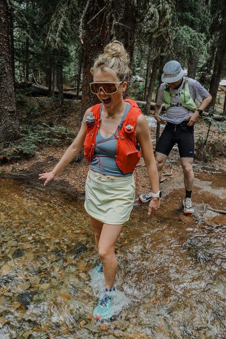 Orange Hydration Vest Over Grey Tank and Yellow Skirt Orange Hydration Vest Over Grey Tank and Yellow Skirt — Cute Running Outfits