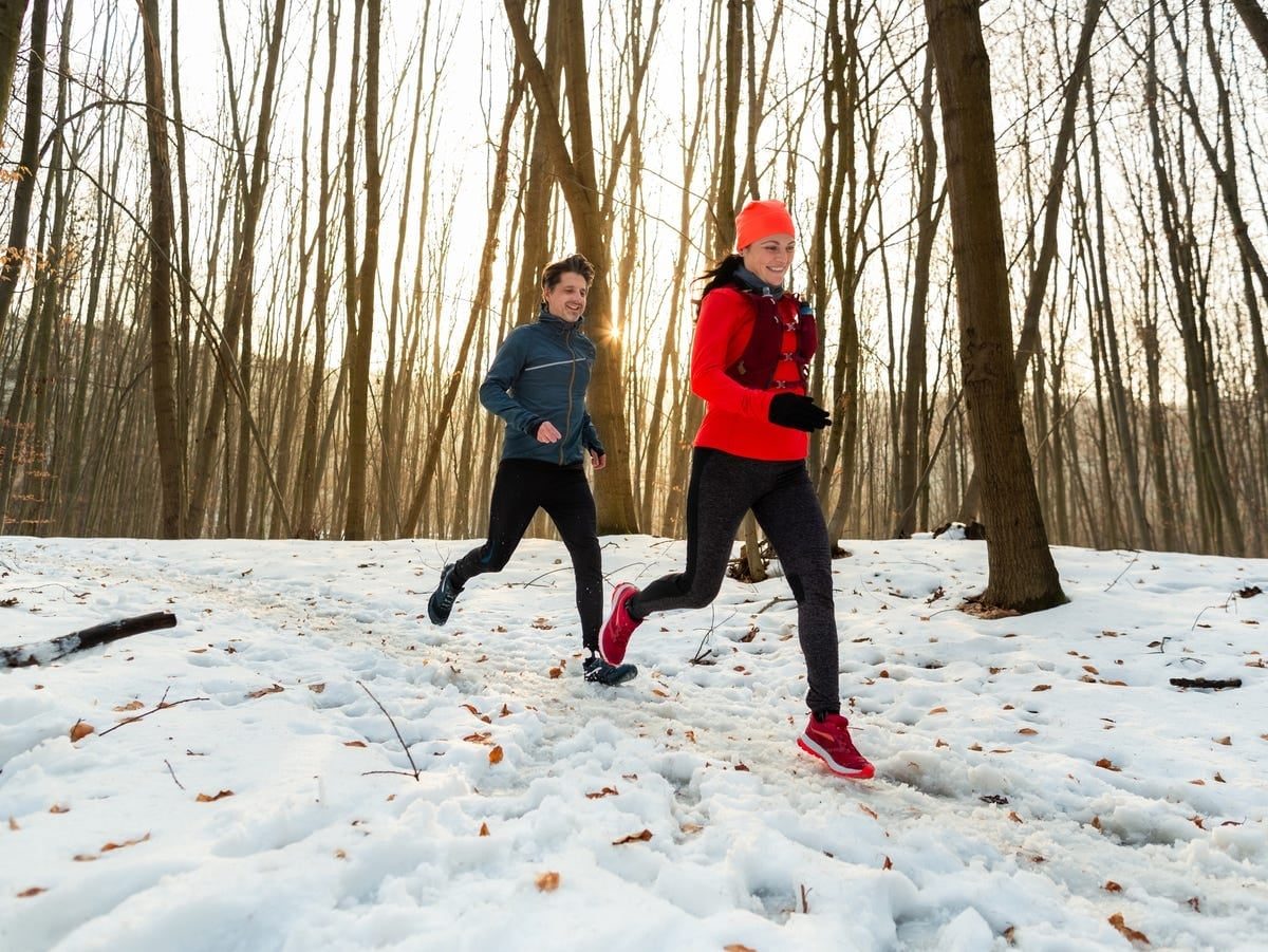 Red Vest Over Long-Sleeve Top in Snowy Forest Red Vest Over Long-Sleeve Top in Snowy Forest — Cute Running Outfits