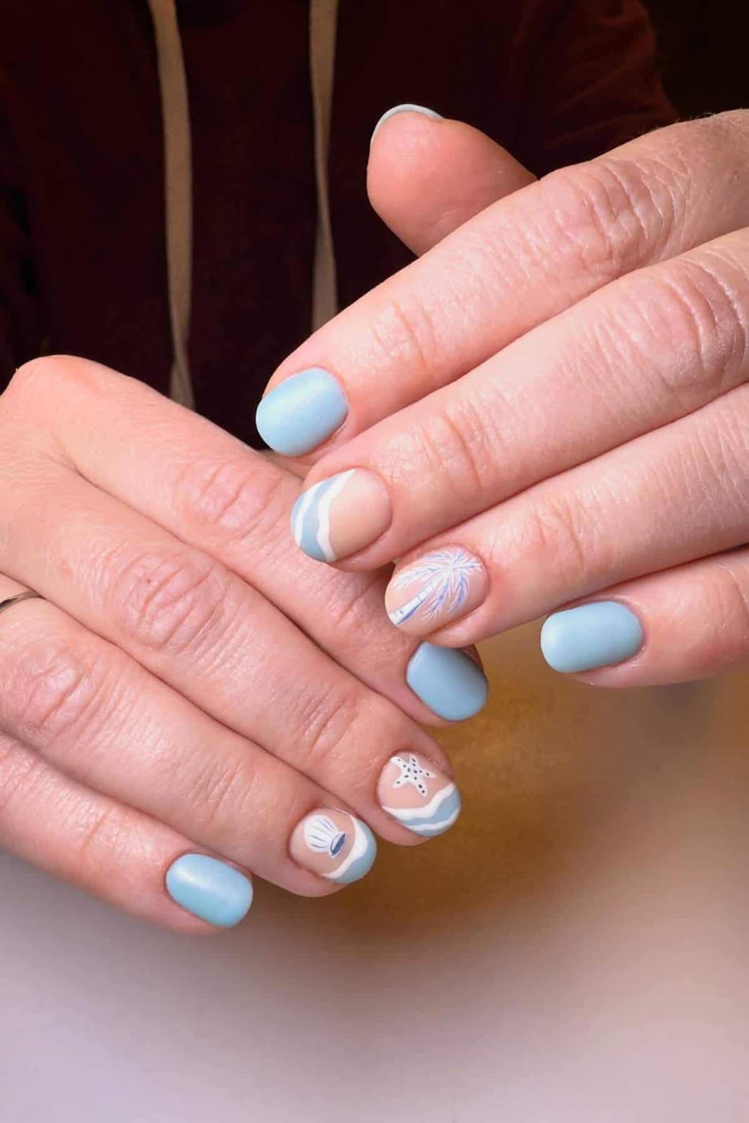 Matte Light Blue With Beach Theme Art Nails Matte Light Blue With Beach Theme Art Nails — Cute Short Round Nails