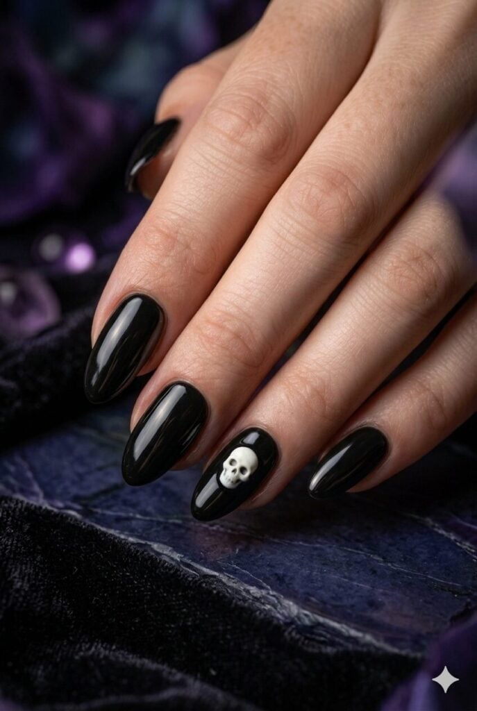 Glossy Black Almond Nails With 3D Skull Charm Glossy Black Almond Nails With 3D Skull Charm — Cute Skull Nails