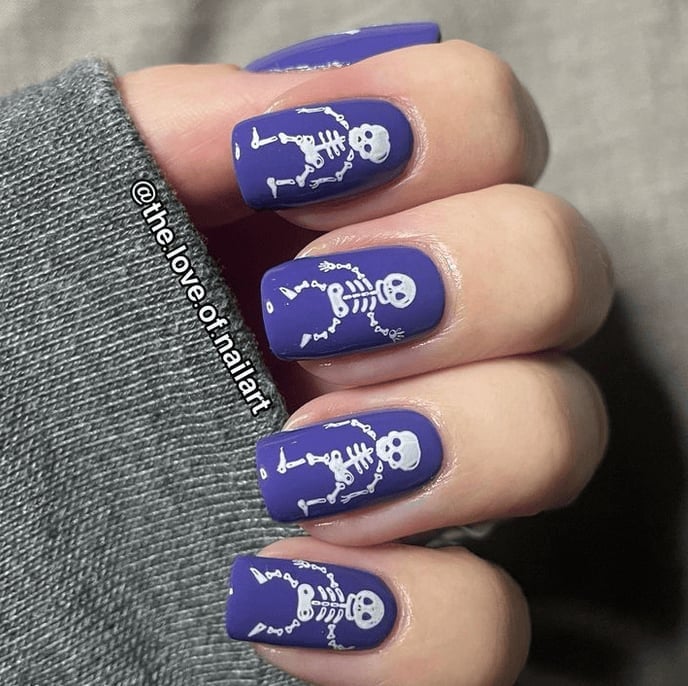 Short Matte Purple Nails With White Skeletons Short Matte Purple Nails With White Skeletons — Cute Skull Nails