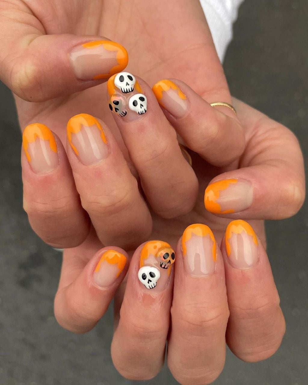 Short Almond Nails With Orange French Tips And Skulls Short Almond Nails With Orange French Tips And Skulls — Cute Skull Nails