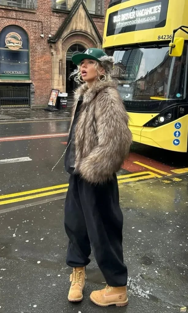 Black Sweatpants with Faux Fur Coat and Timberlands — Cute Sweatpants Outfit Inspo