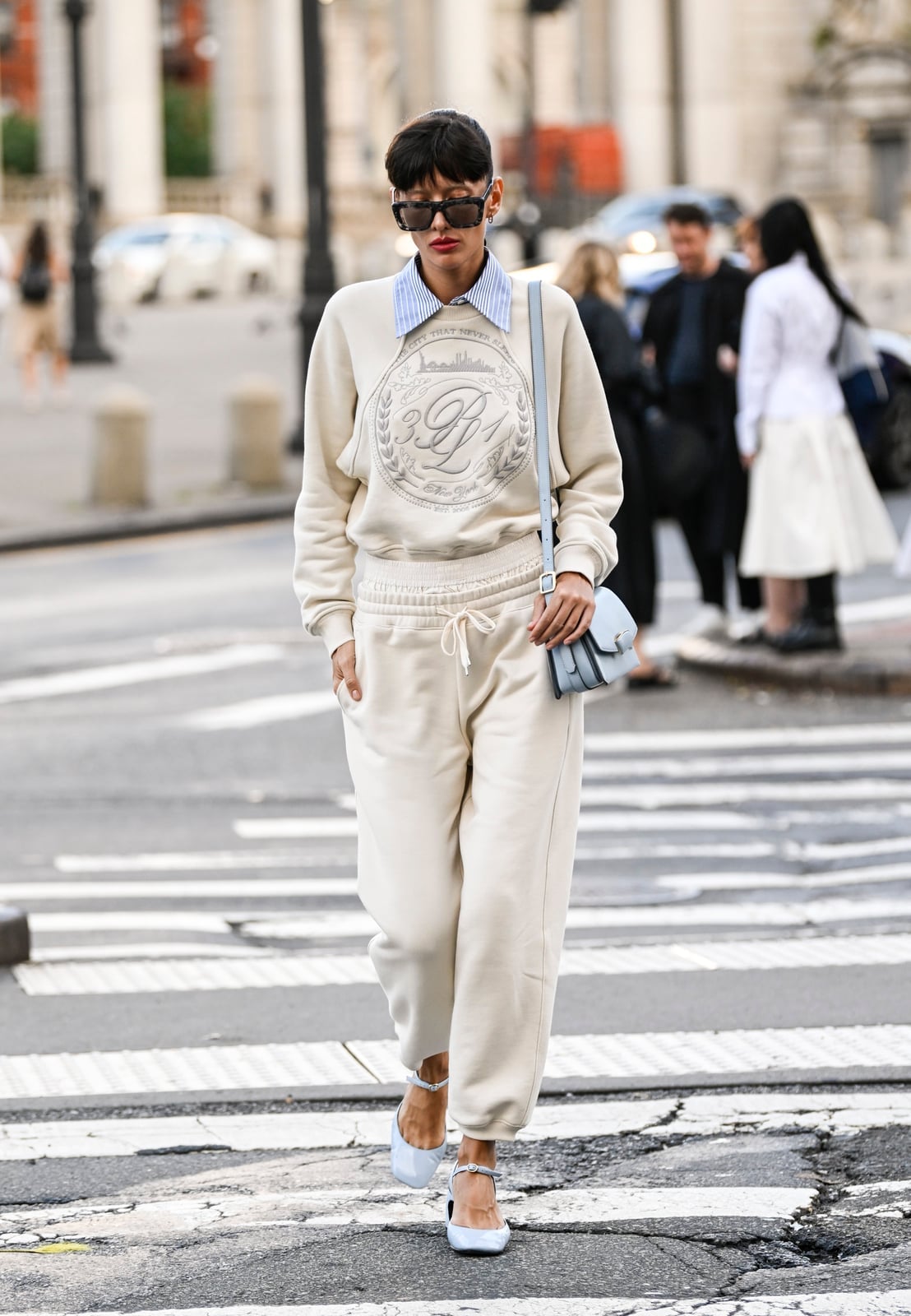 Cream Sweatpants with Striped Shirt and Light Blue Accents — Cute Sweatpants Outfit Inspo