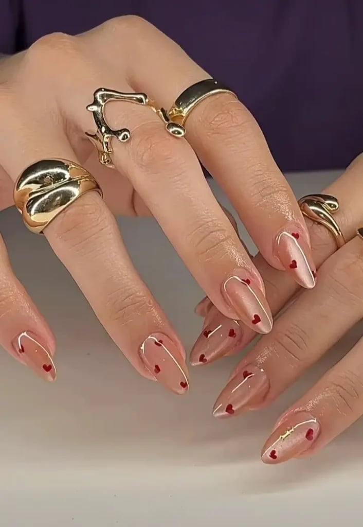 Sheer Nude Glossy Stiletto with Red Hearts Sheer Nude Glossy Stiletto with Red Hearts — Cute Trendy Nails