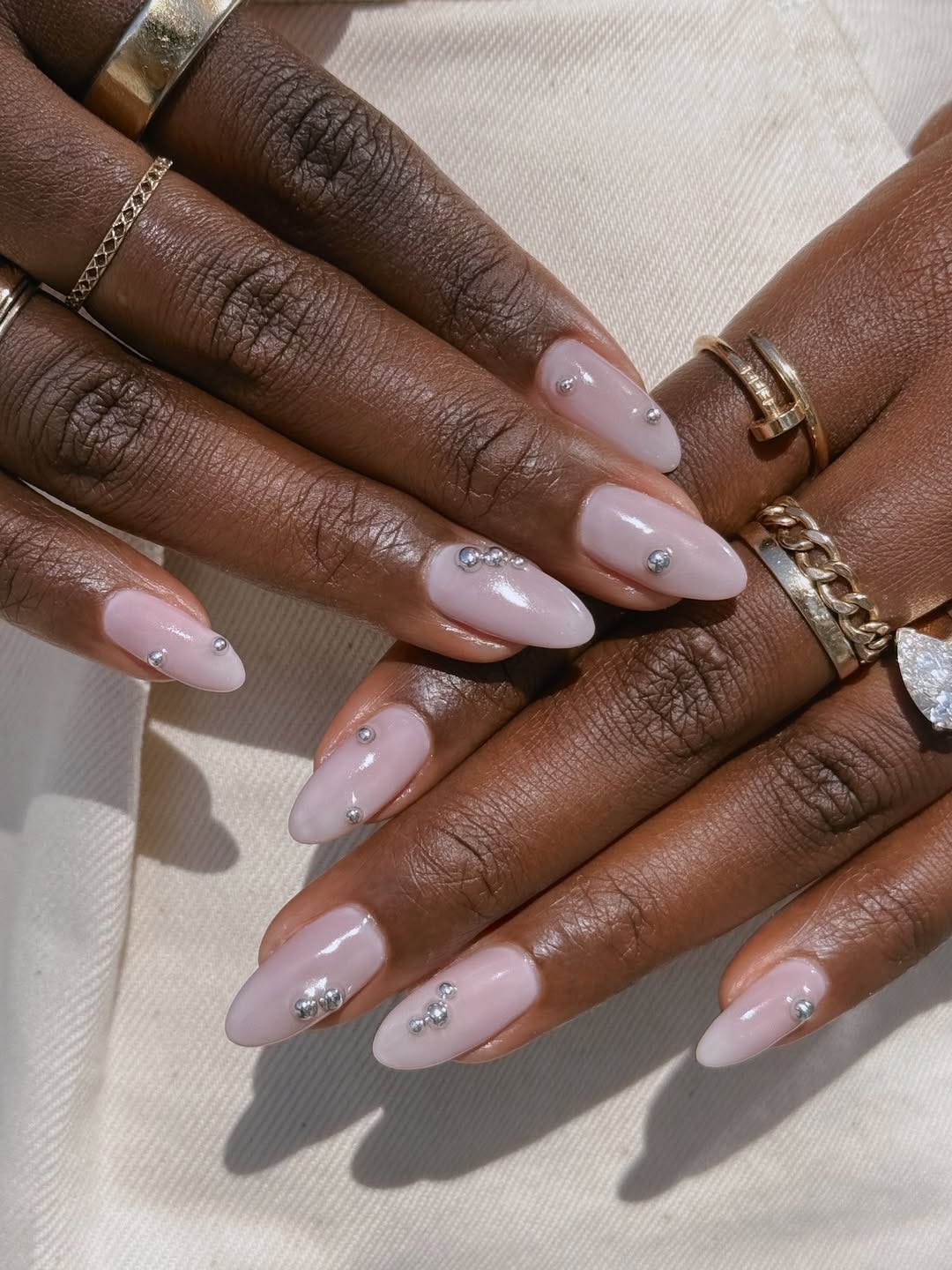 Medium Almond Milky Pink with Silver Studs Medium Almond Milky Pink with Silver Studs — Cute Trendy Nails