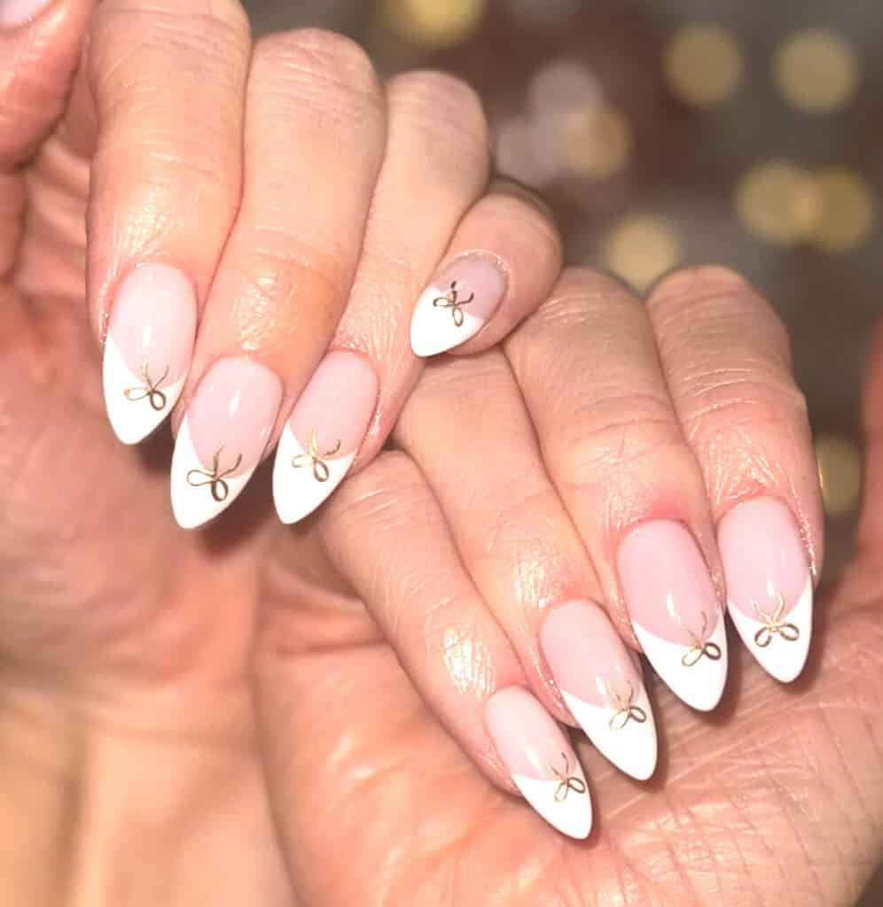 Medium Almond White French Tips with Gold Bows Medium Almond White French Tips with Gold Bows — Cute White Nails