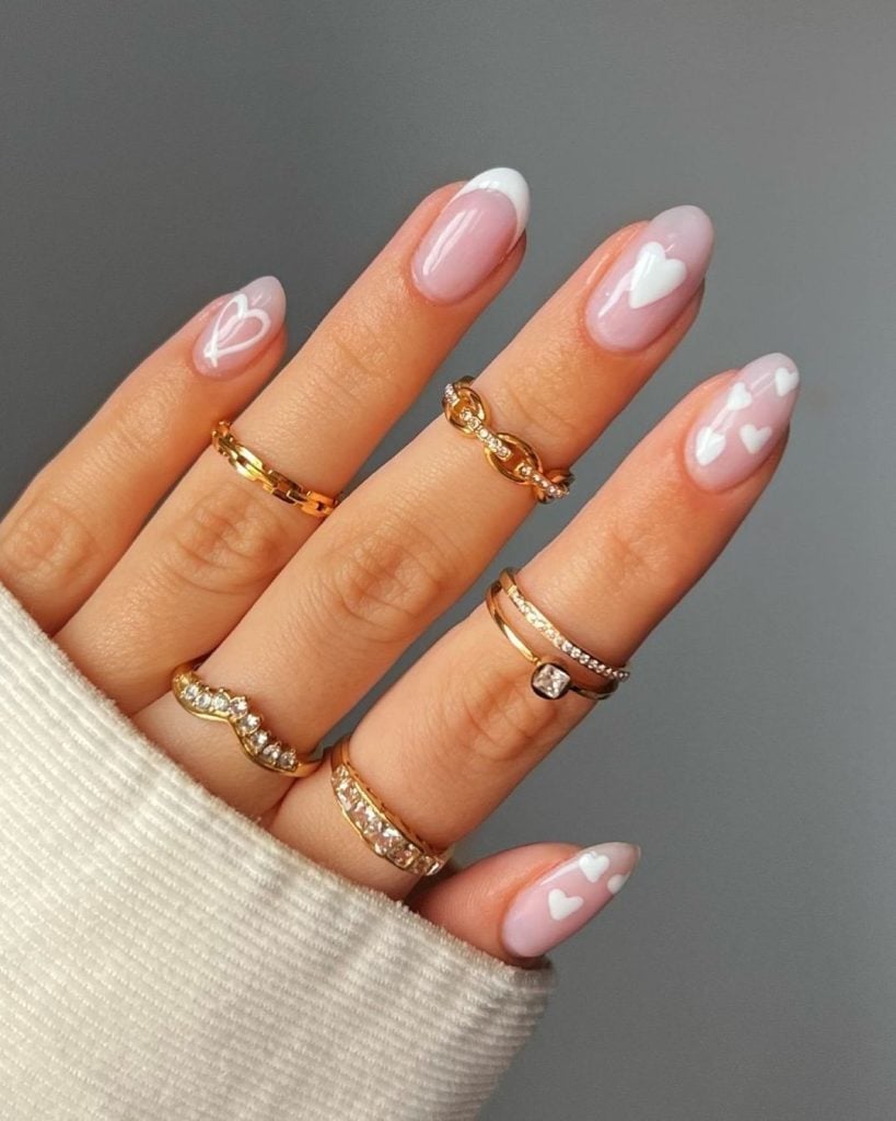 Sheer Pink Medium Oval Nails with White French Tips and Hearts Sheer Pink Medium Oval Nails with White French Tips and Hearts — Cute White Nails