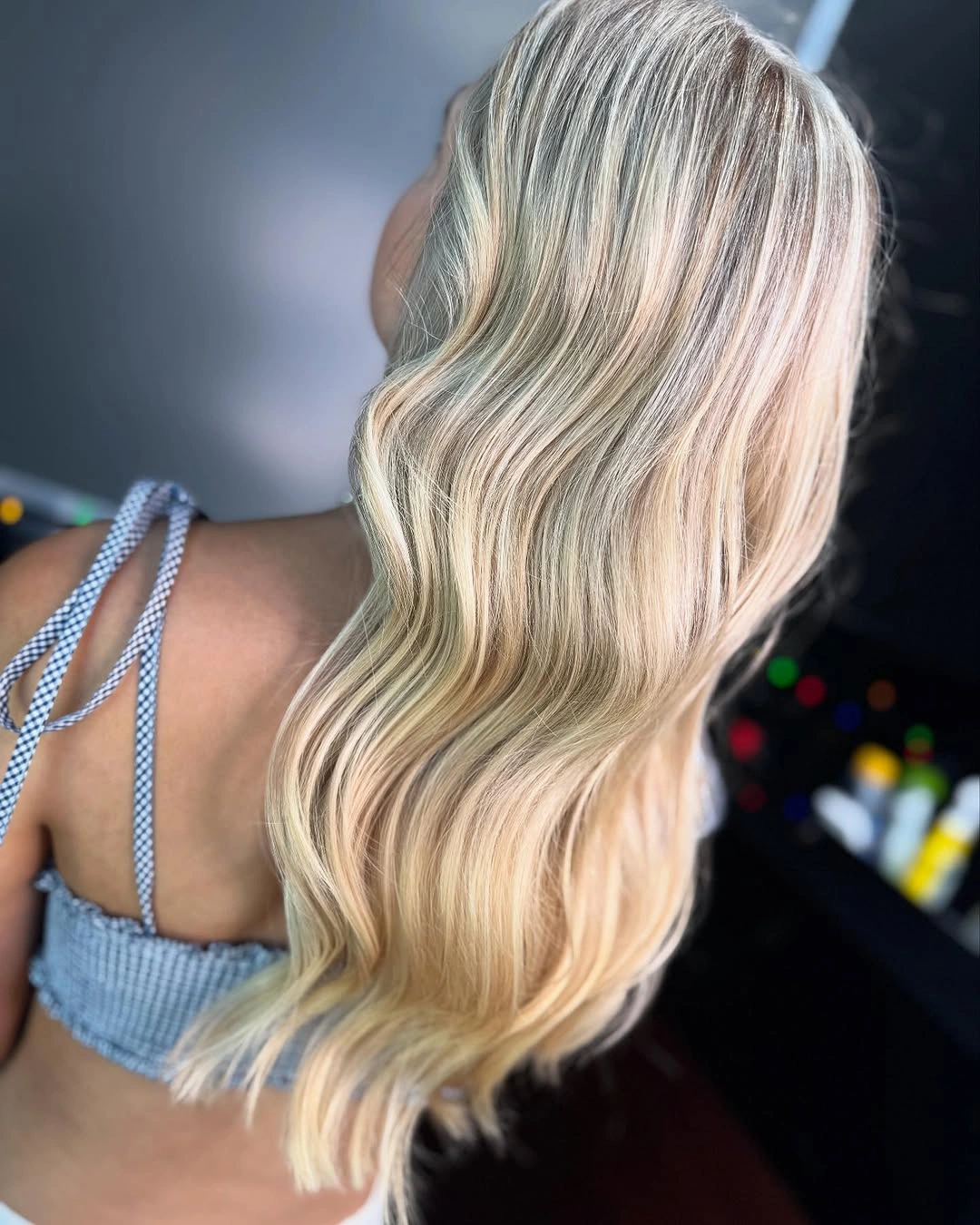 Long pale cream blonde waves with fine cool-toned strands throughout