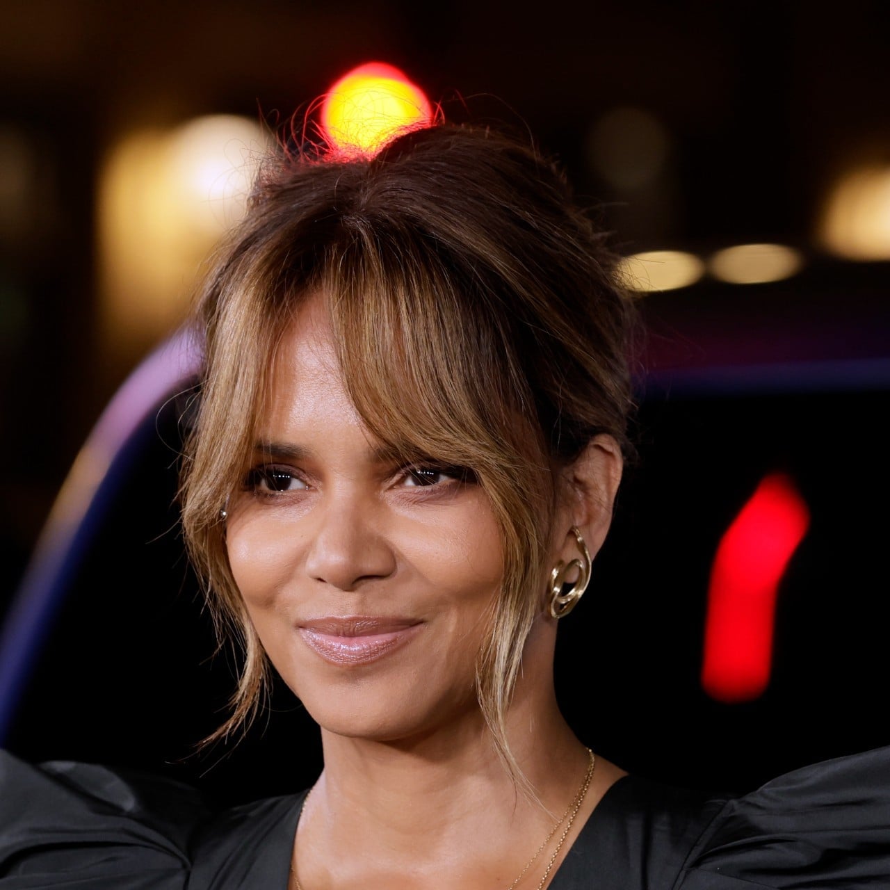Long Black Hair With Voluminous Bangs — Easy Ways to Style Curtain Bangs
