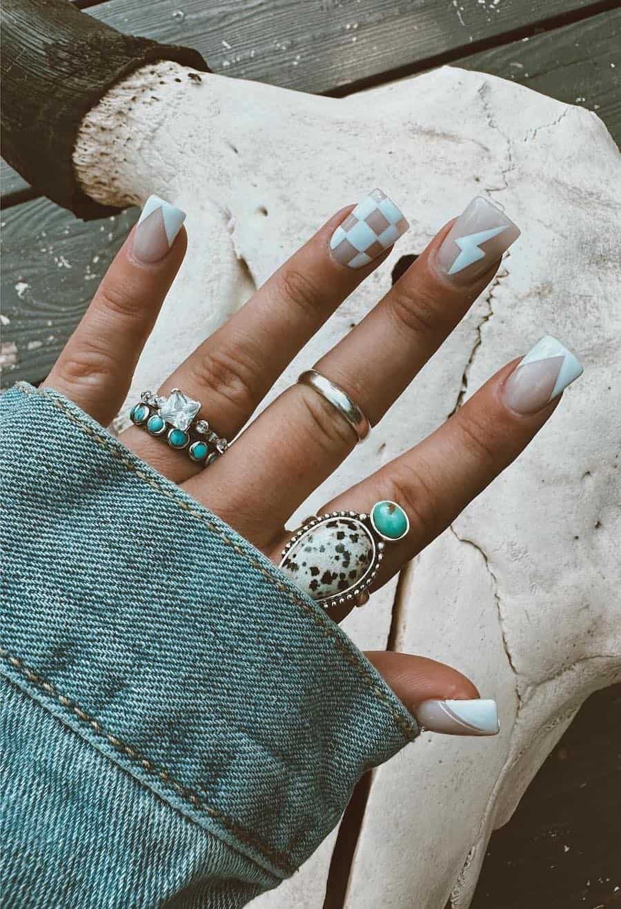 Short Almond Mix of Cow Print and Geometric Short Almond Mix of Cow Print and Geometric — Easy Western Nails