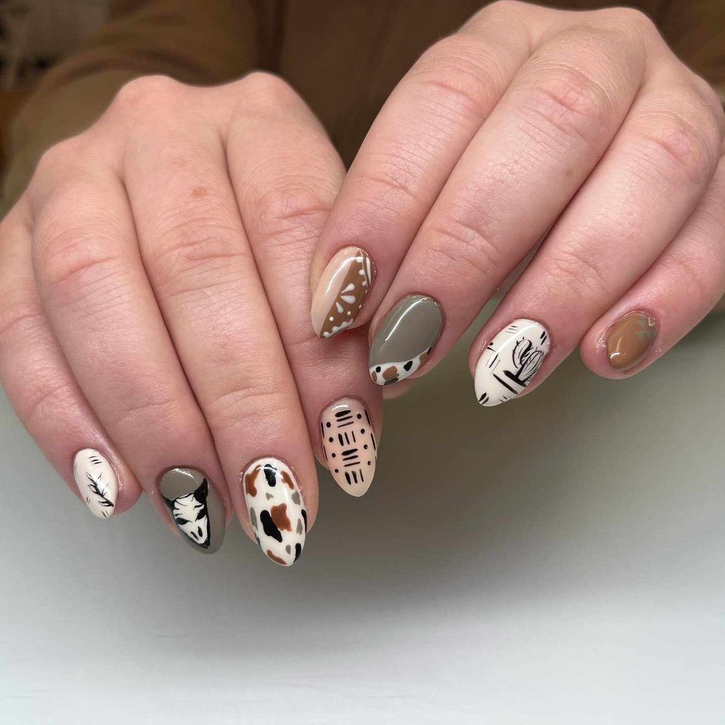 Short Oval Cow Print with Abstract Accents Short Oval Cow Print with Abstract Accents — Easy Western Nails