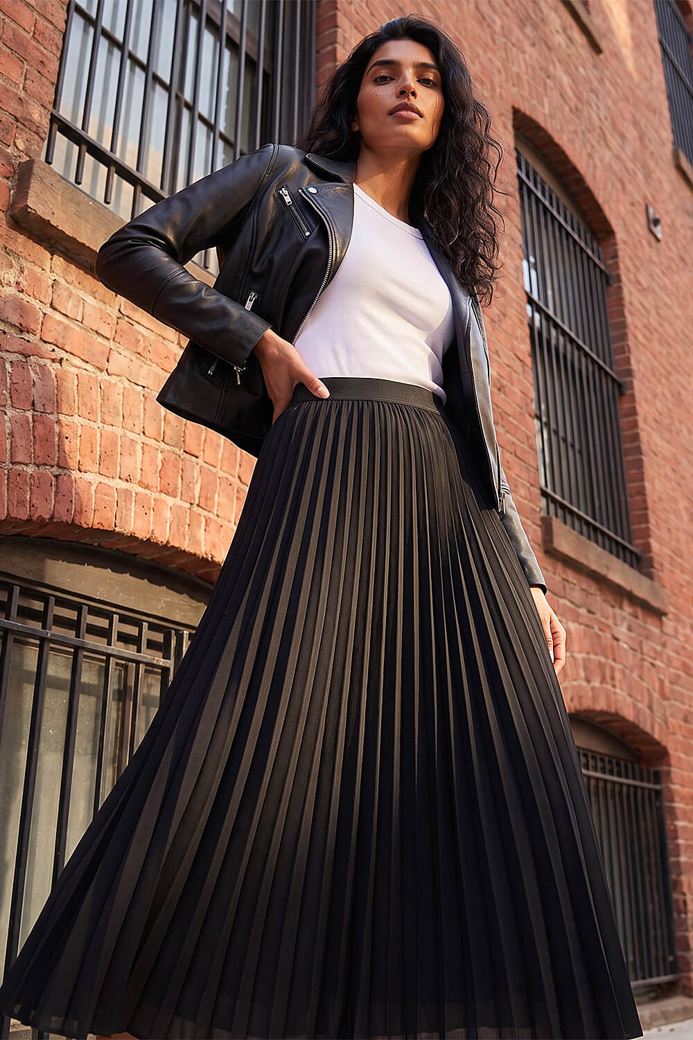 Flowing Pleated Maxi Skirt With Moto Jacket Flowing Pleated Maxi Skirt With Moto Jacket — Elegant Black Maxi Skirt Outfit